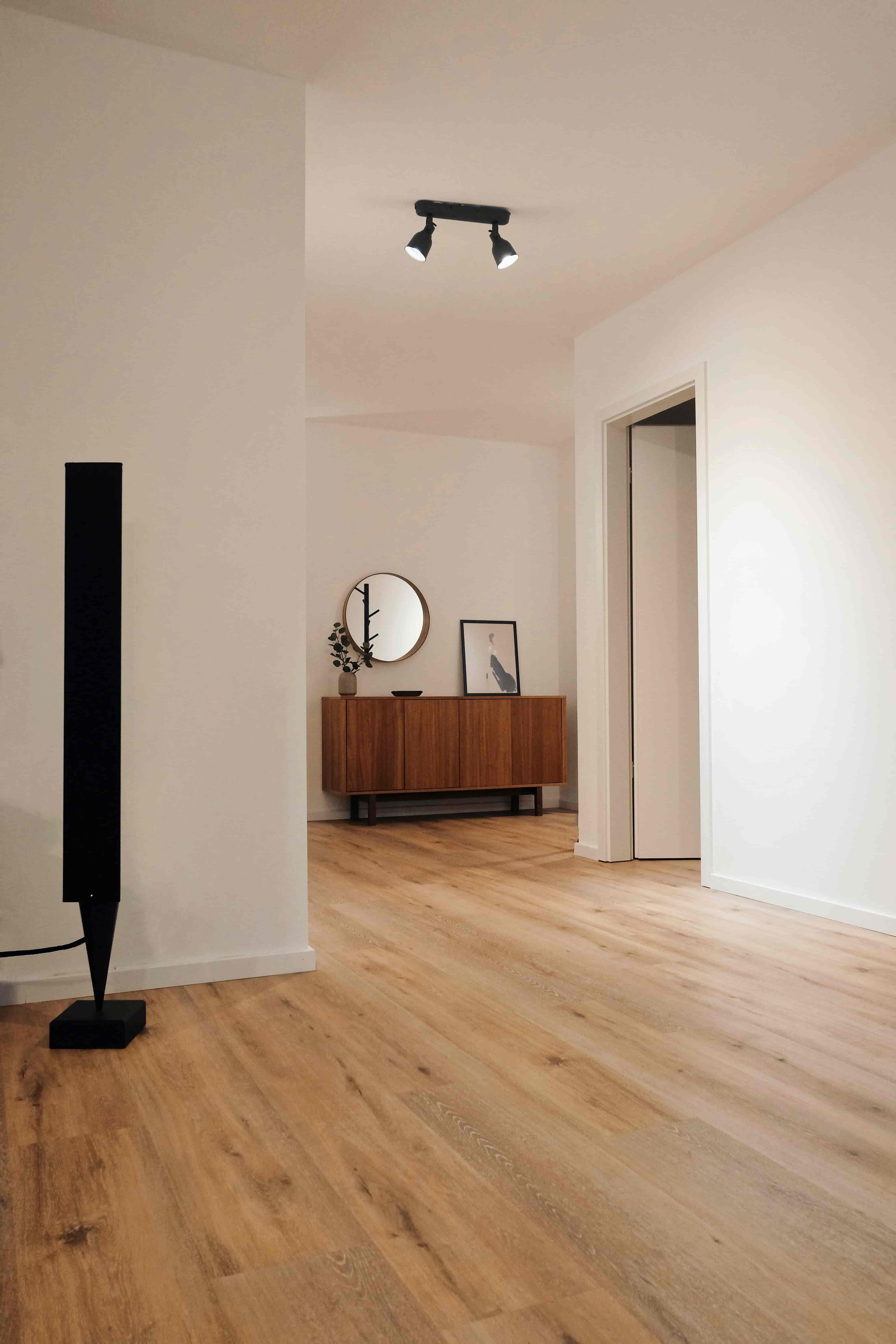 Luxurious bathroom with wooden flooring